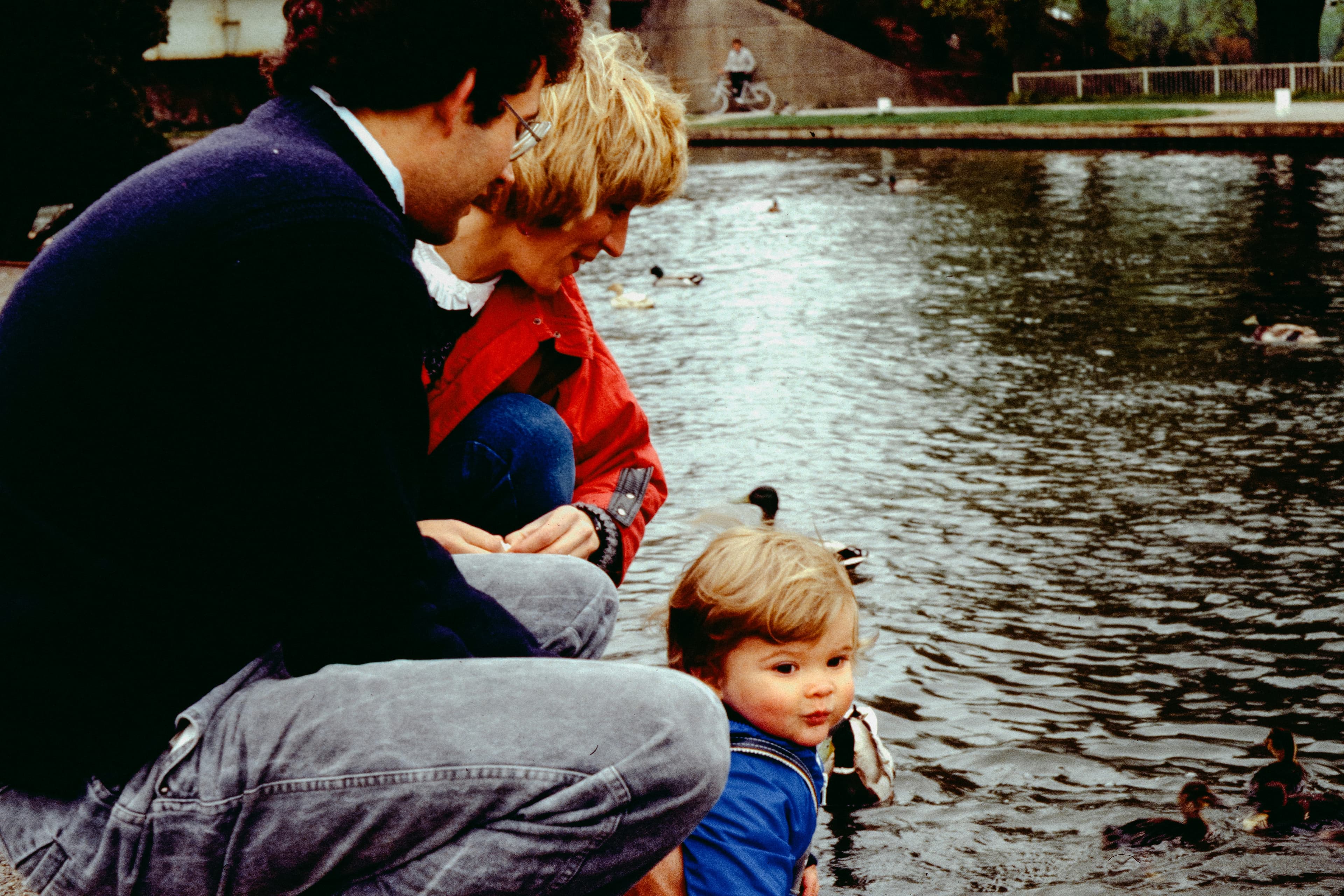 A family spending a quiet moment together by the water
